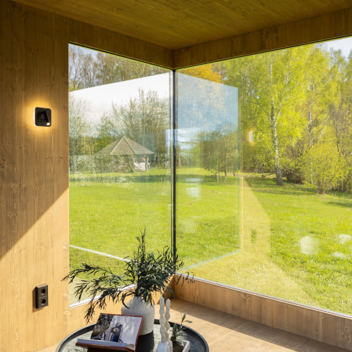 Genevas sauna lounge interior darker tone wood version